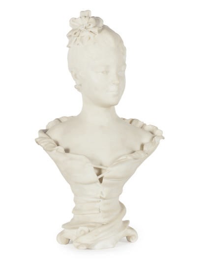 A MARBLE BUST OF A LADY,