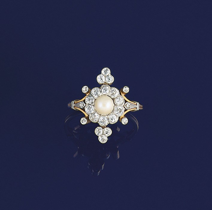 An Edwardian diamond and pearl cluster ring
