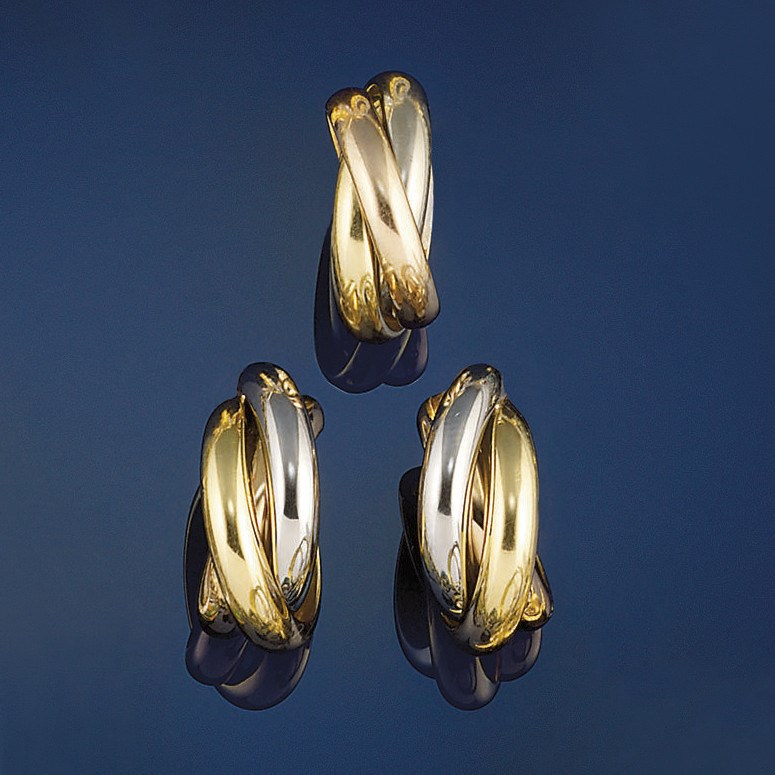 A pair of 18ct. three colour gold earrings and a ring, by Cartier