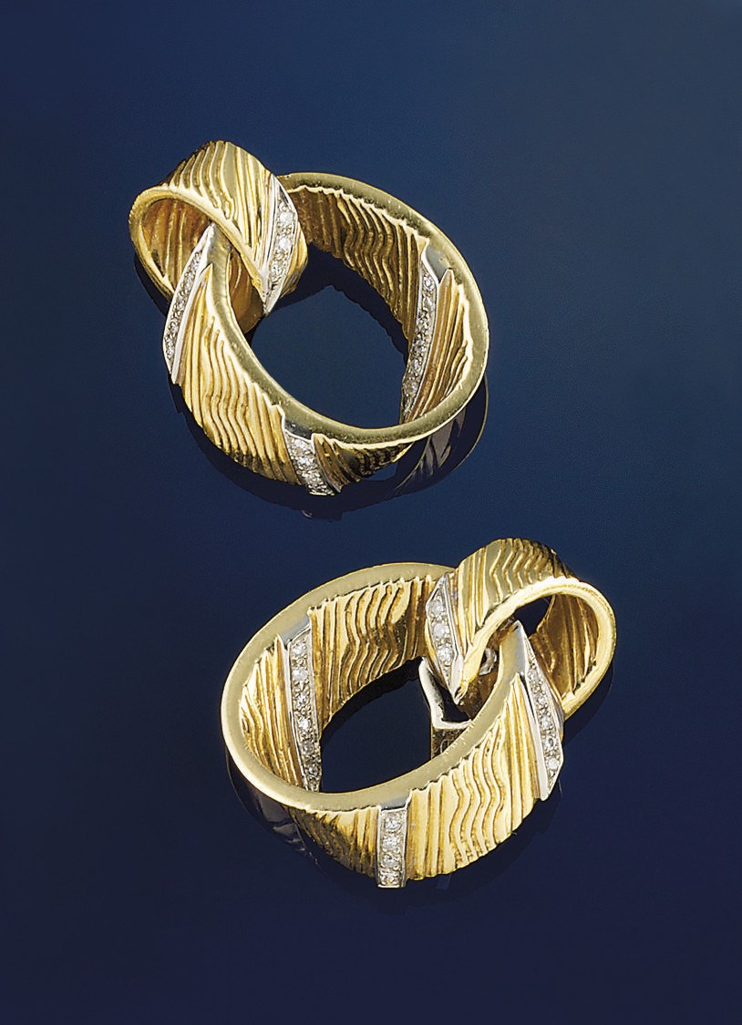 A pair of diamond set earpendants