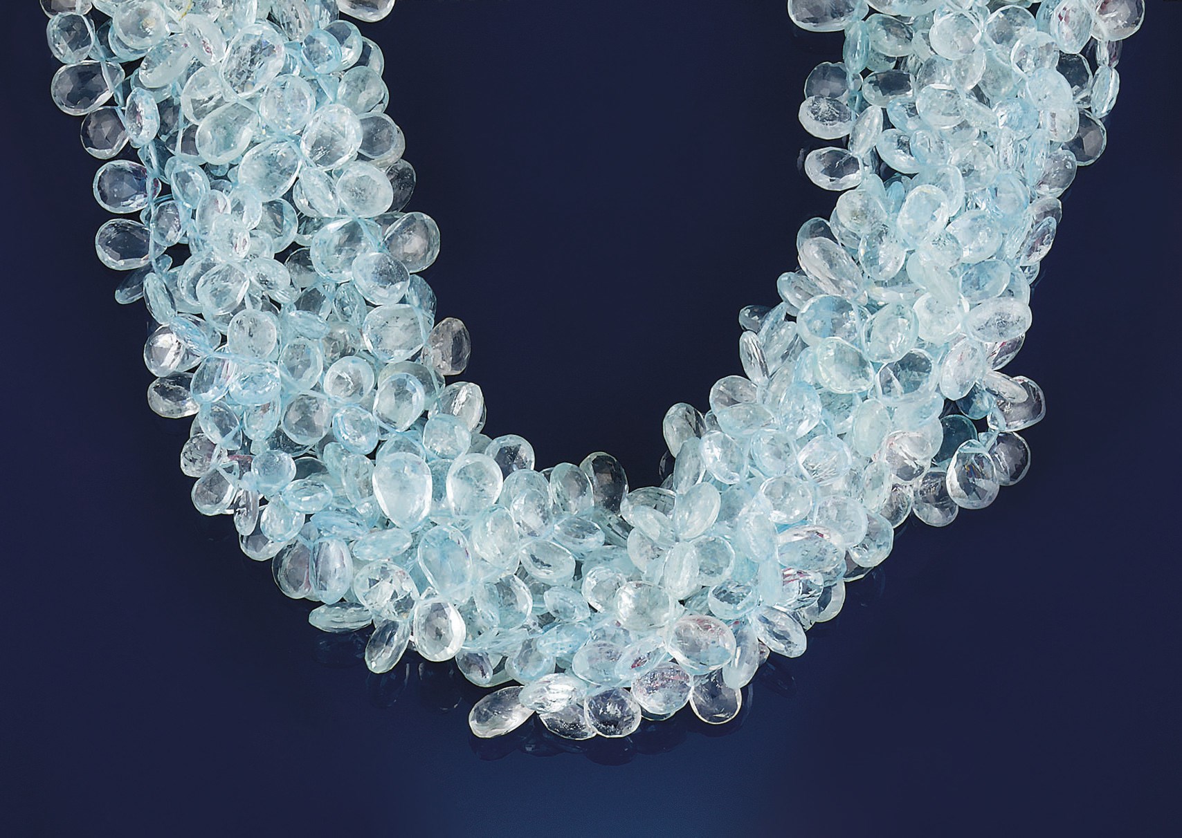 An aquamarine and garnet torsade necklace