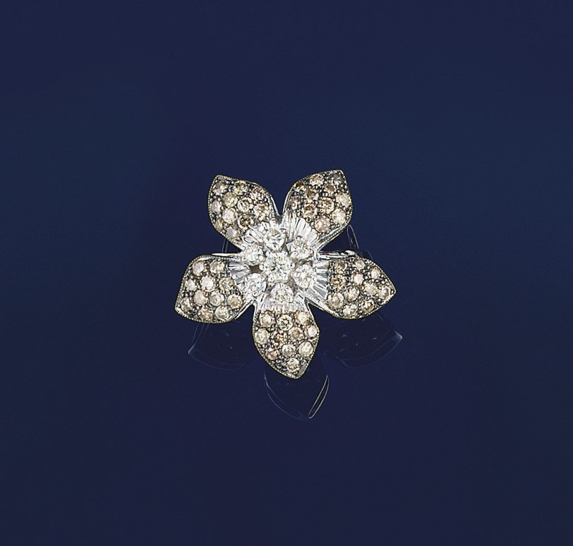 A coloured diamond and diamond ring
