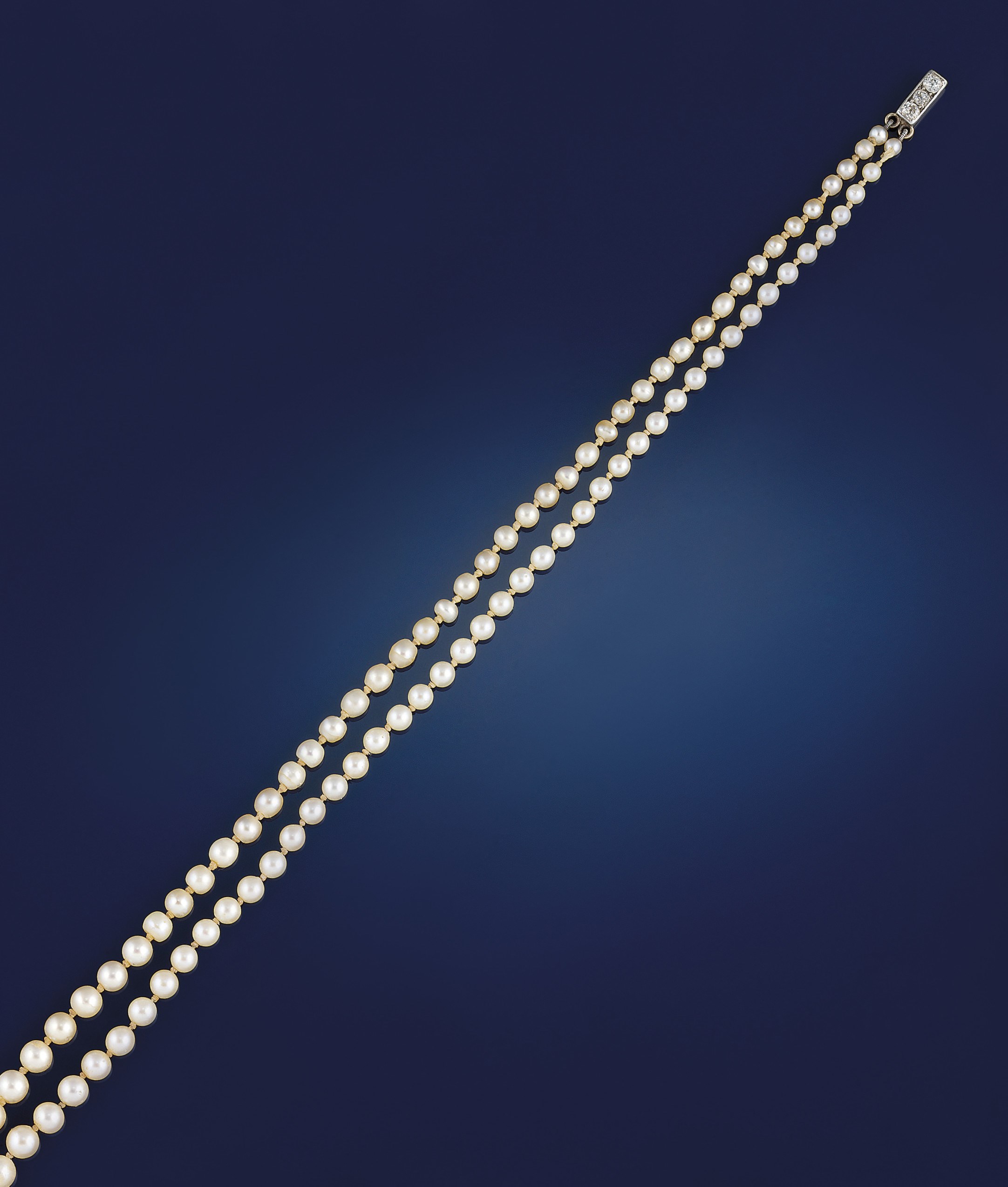 A pearl and cultured pearl necklace