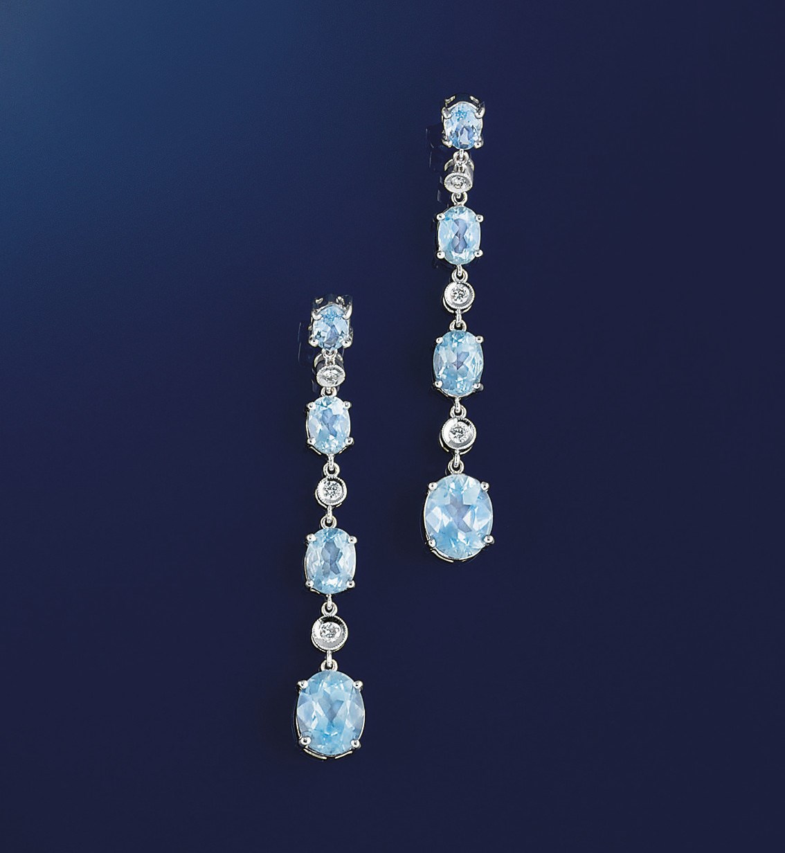 A PAIR OF AQUAMARINE AND DIAMOND EARPENDANTS