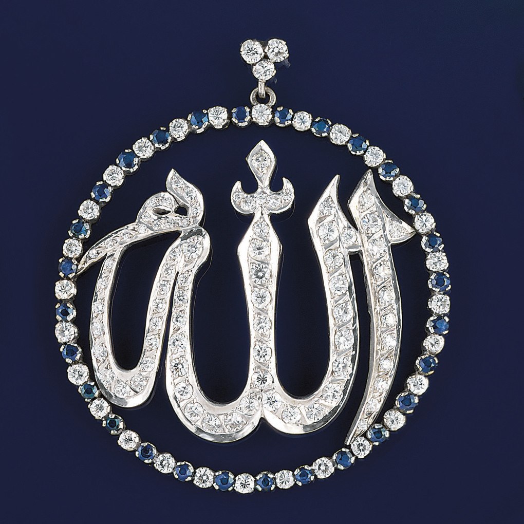 A diamond and sapphire pendant