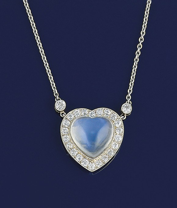 A moonstone and diamond pendant