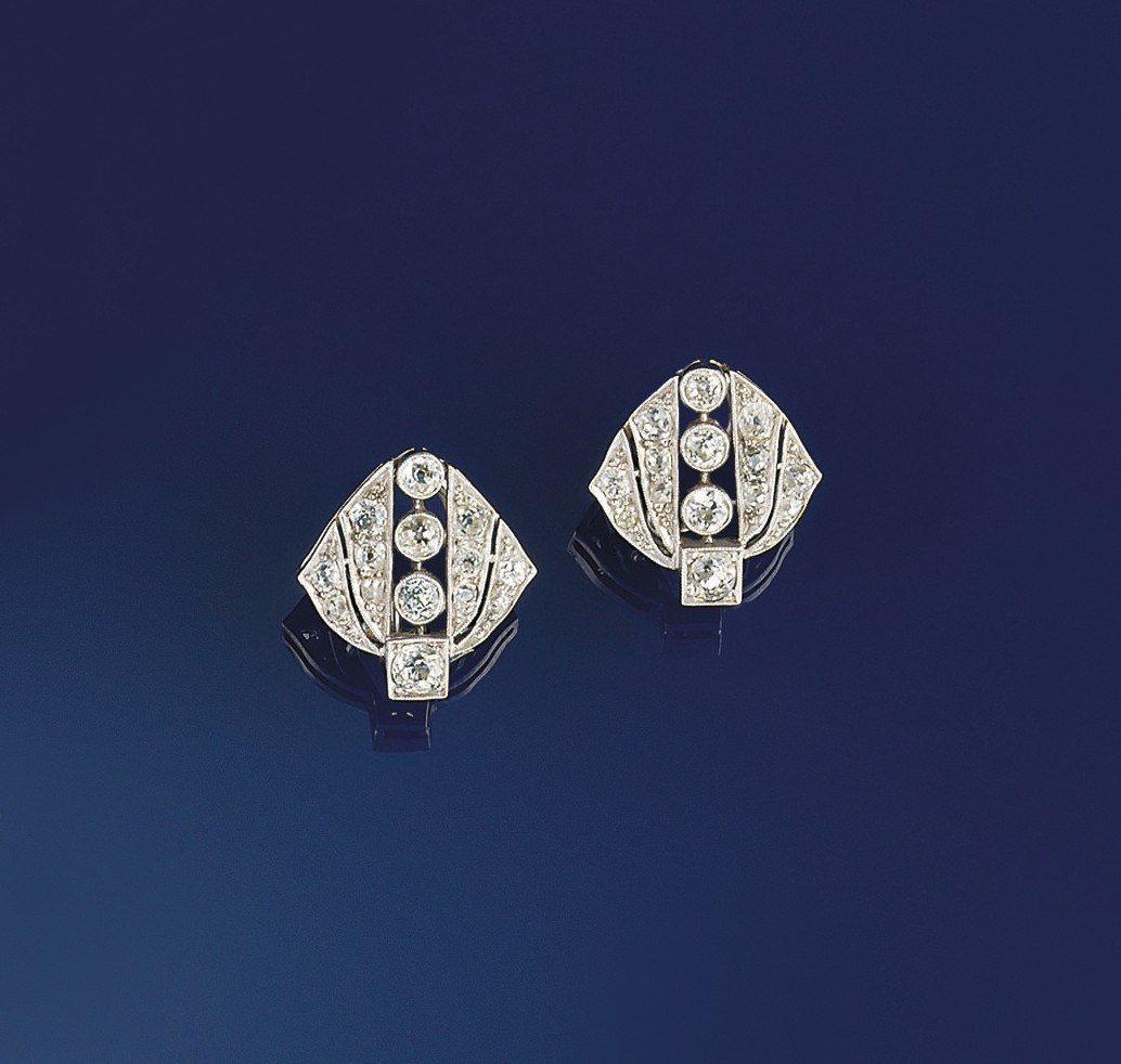 A pair of diamond earclips
