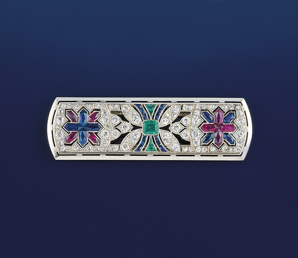 A diamond, emerald, ruby and sapphire brooch