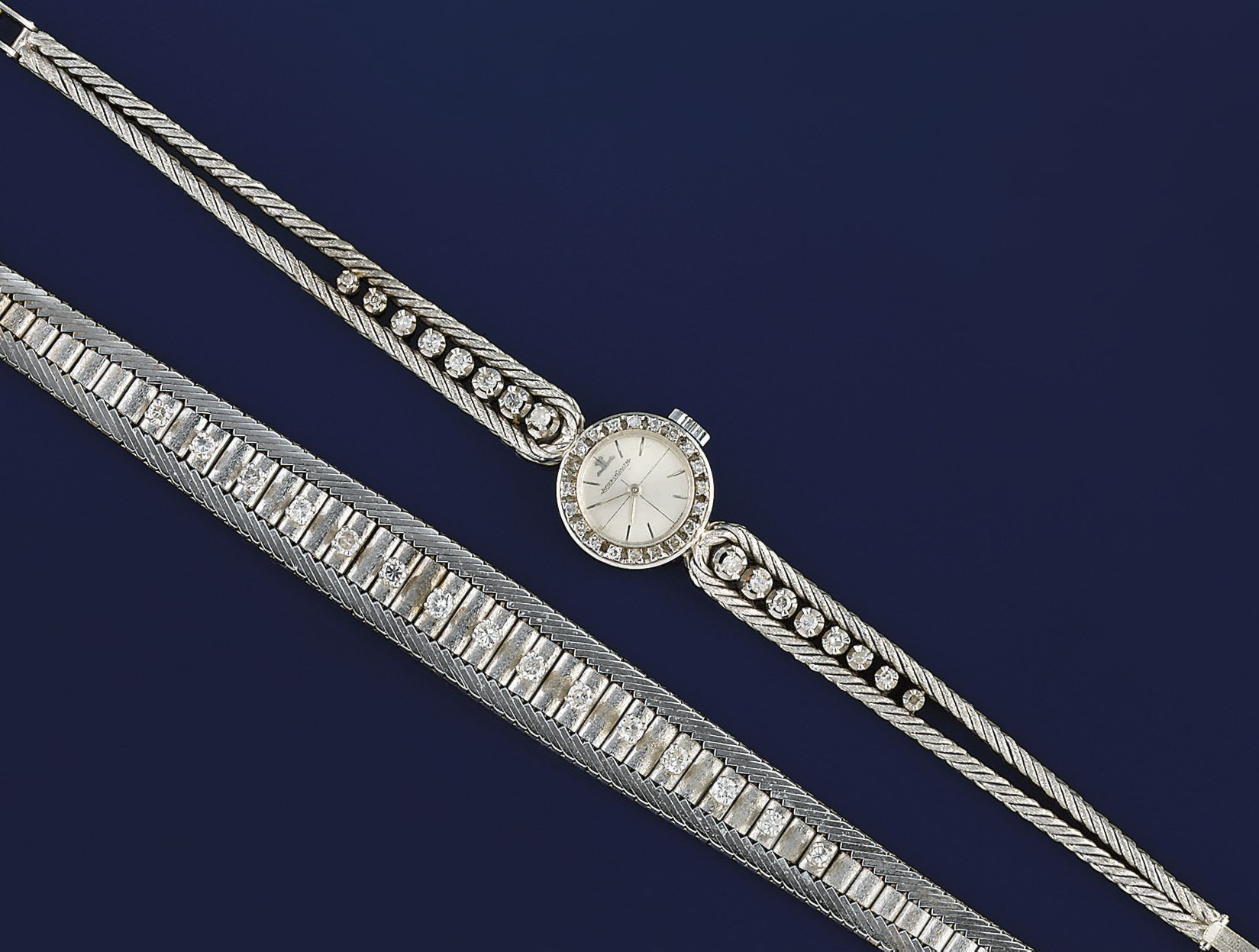 A DIAMOND WRISTWATCH AND BRACELET