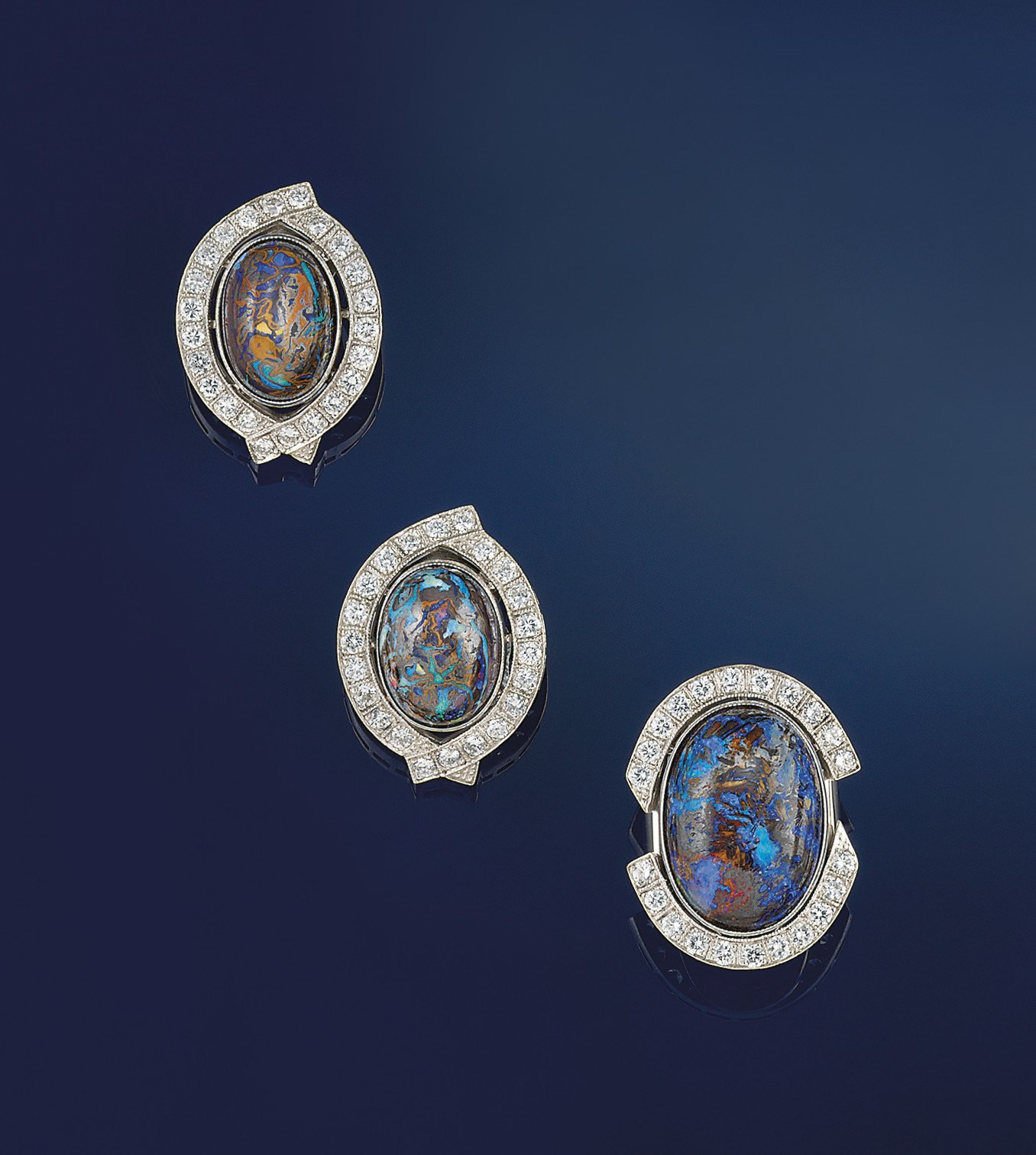 AN OPAL-IN-MATRIX AND DIAMOND RING AND EARCLIPS