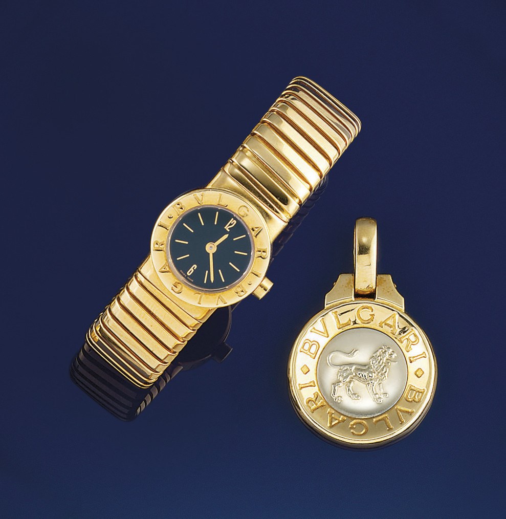 A lady's quartz "tubogas" wristwatch and an astrological pendant, by Bulgari