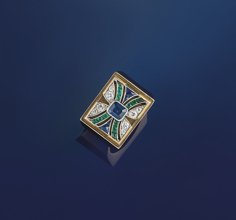 A sapphire, diamond and emerald ring
