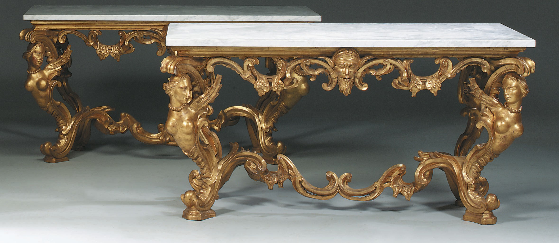 A PAIR OF ITALIAN GILTWOOD SIDE TABLES