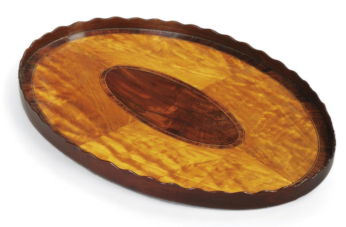 A GEORGE III SATINWOOD, ROSEWOOD AND MAHOGANY OVAL TRAY