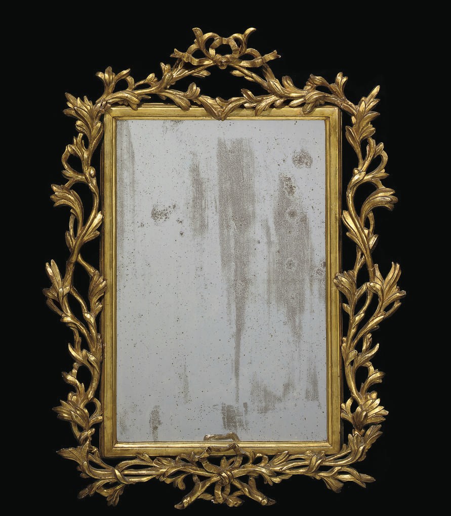 A SOUTH ITALIAN GILT VARNISHED SILVERED ('MECCA') MIRROR