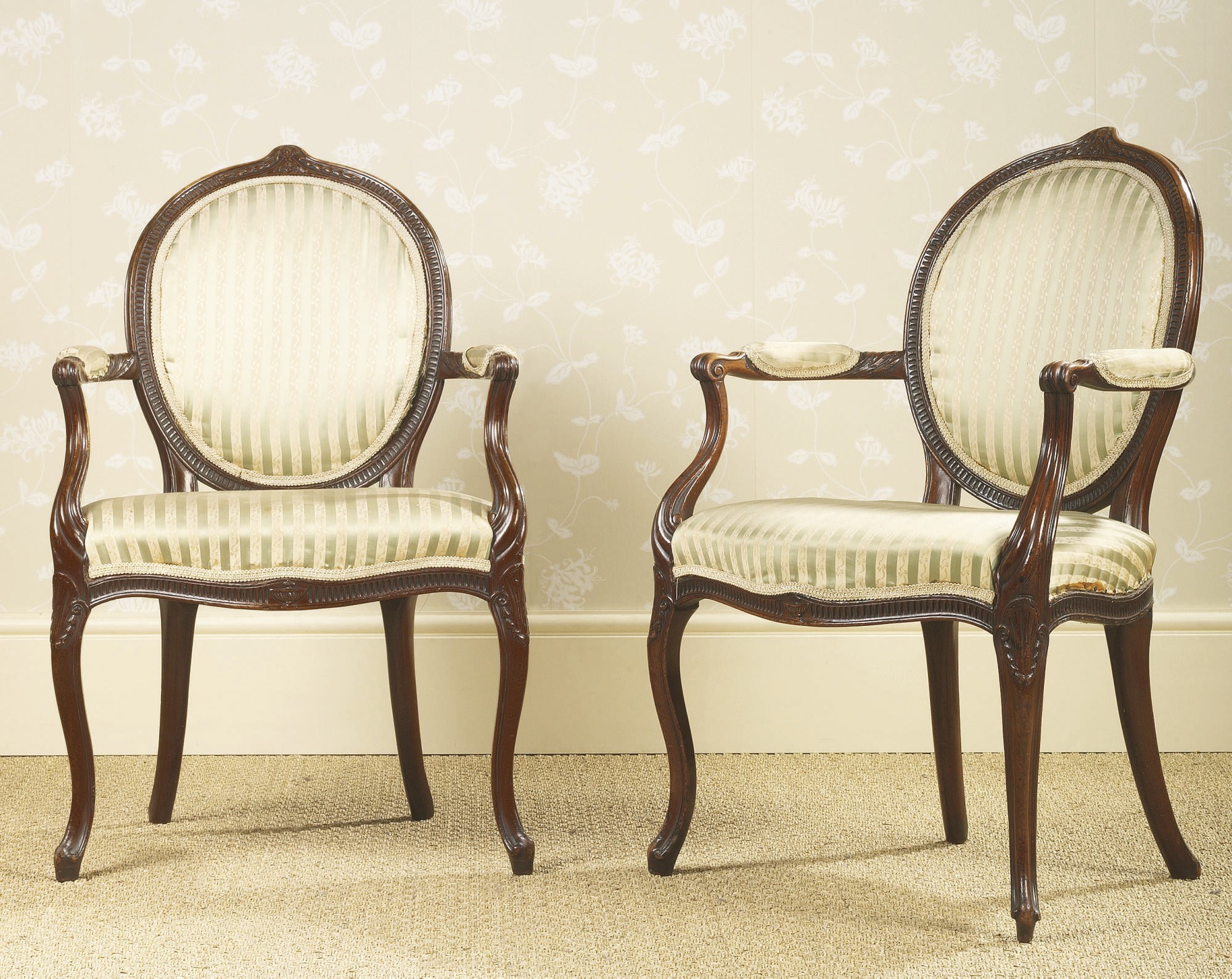 A PAIR OF GEORGE III MAHOGANY ARMCHAIRS