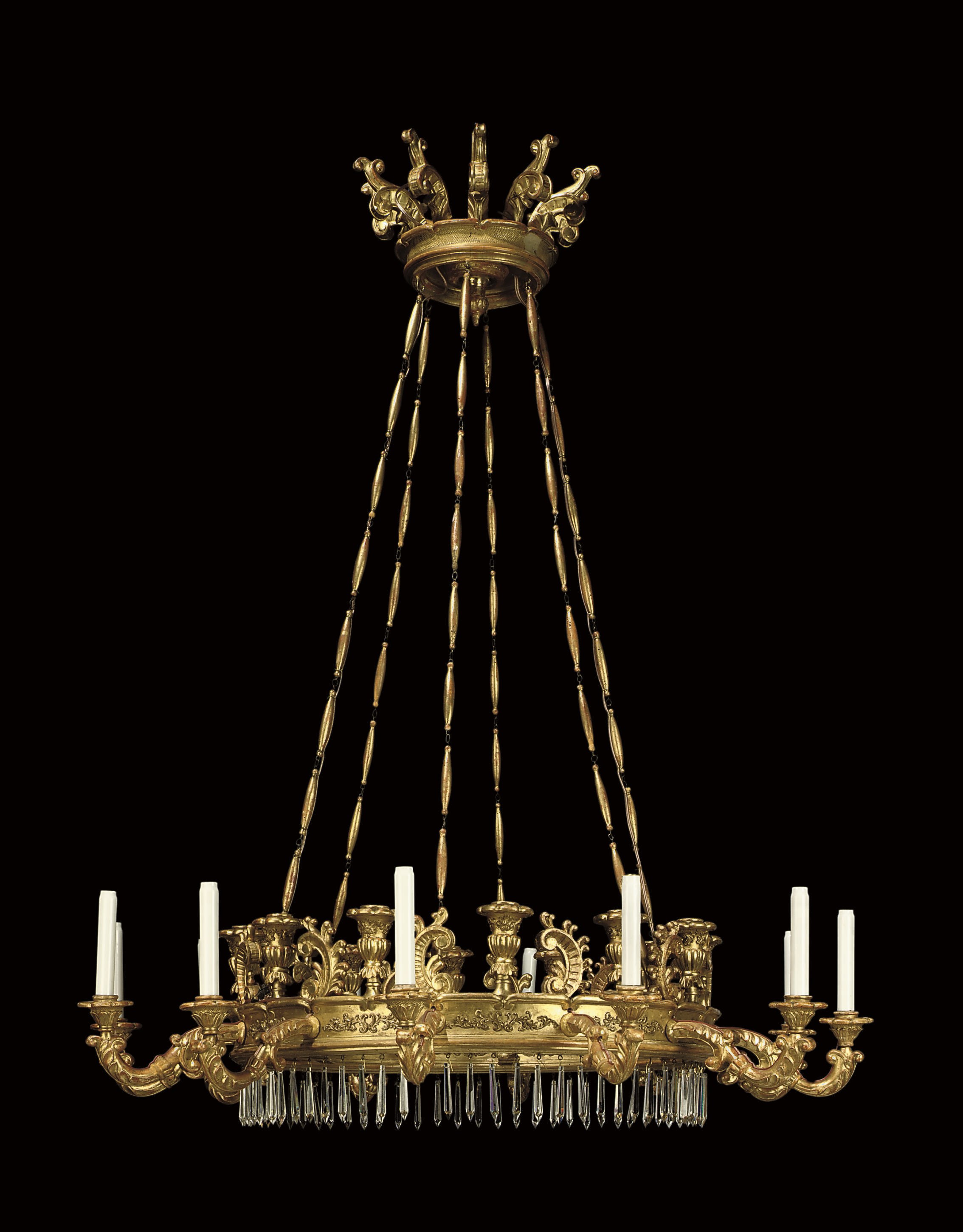 AN ITALIAN GILTWOOD AND PAPIER MACHE TWENTY-FOUR LIGHT CHANDELIER