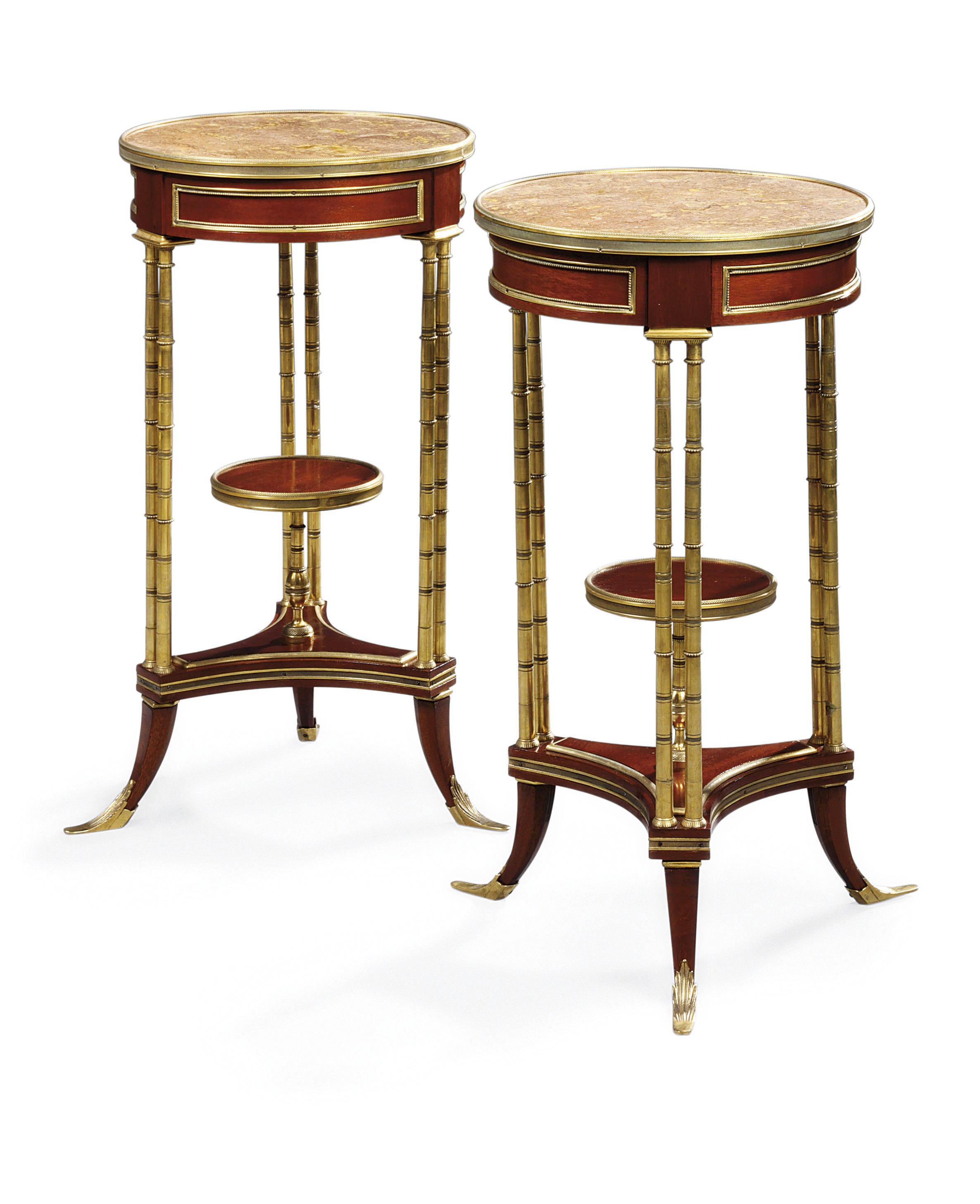 A PAIR OF FRENCH ORMOLU-MOUNTED MAHOGANY GUERIDONS