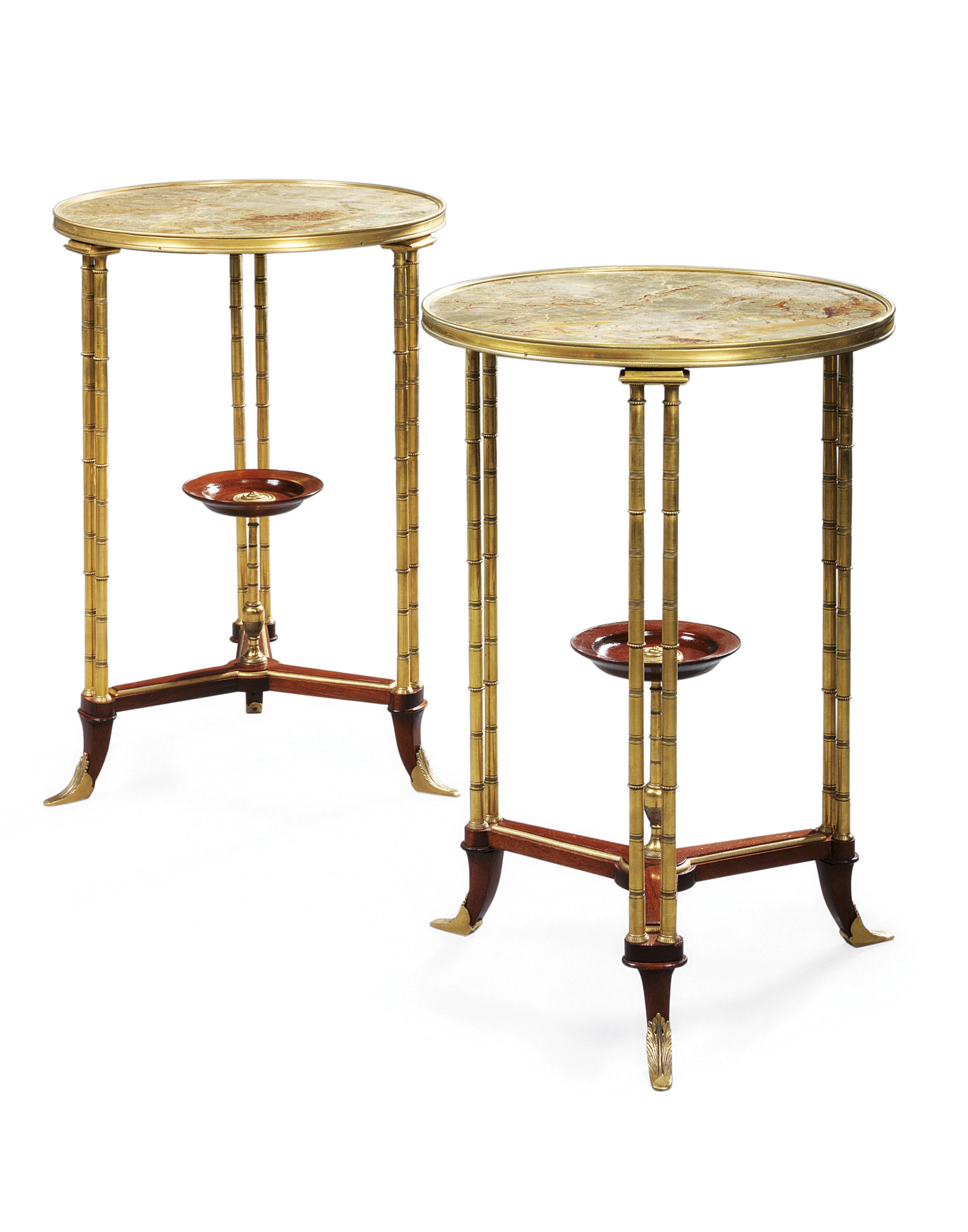 A PAIR OF FRENCH ORMOLU-MOUNTED MAHOGANY GUERIDONS