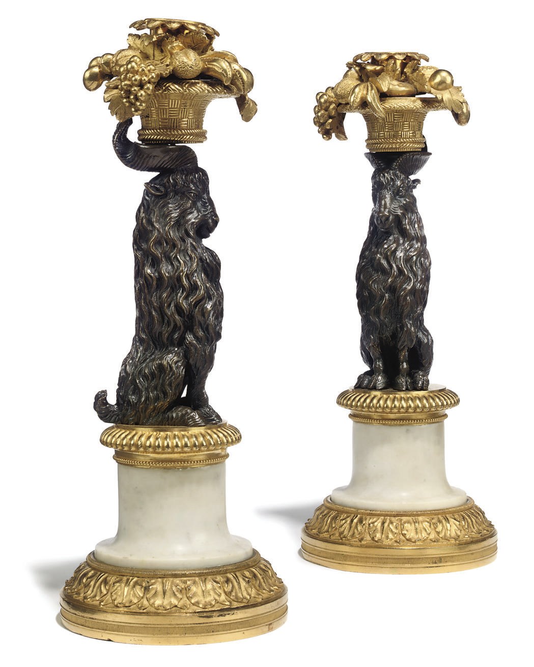 A PAIR OF LATE LOUIS XVI ORMOLU AND PATINATED BRONZE CANDLESTICKS