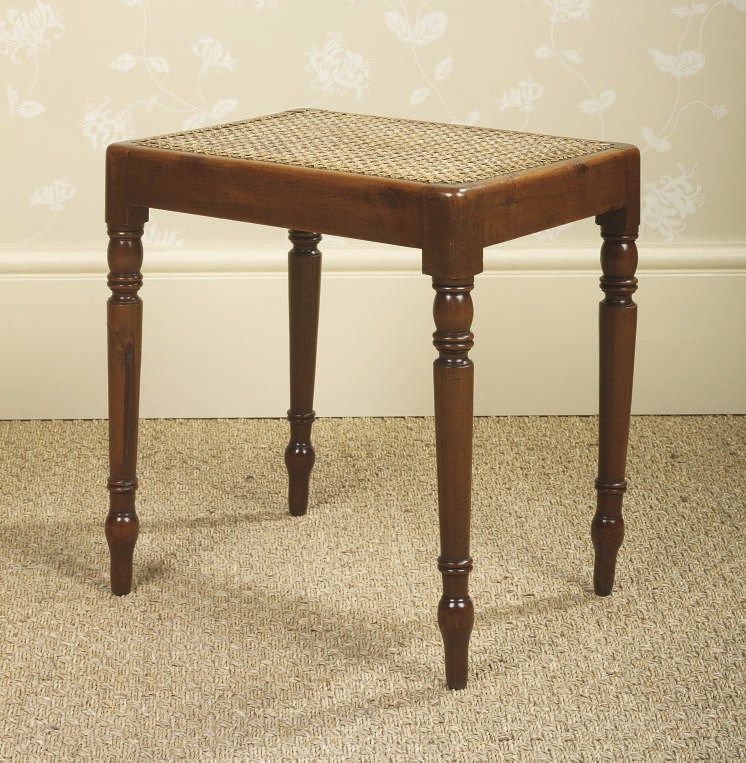 A REGENCY SOLID YEW WOOD CANED STOOL