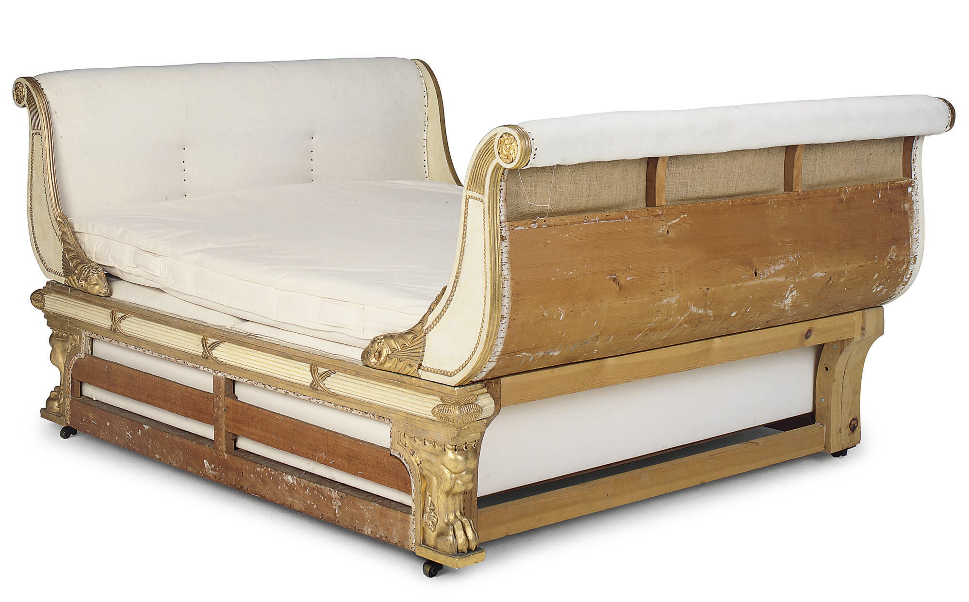 A REGENCY PARCEL-GILT AND WHITE-PAINTED LIT EN BATEAU