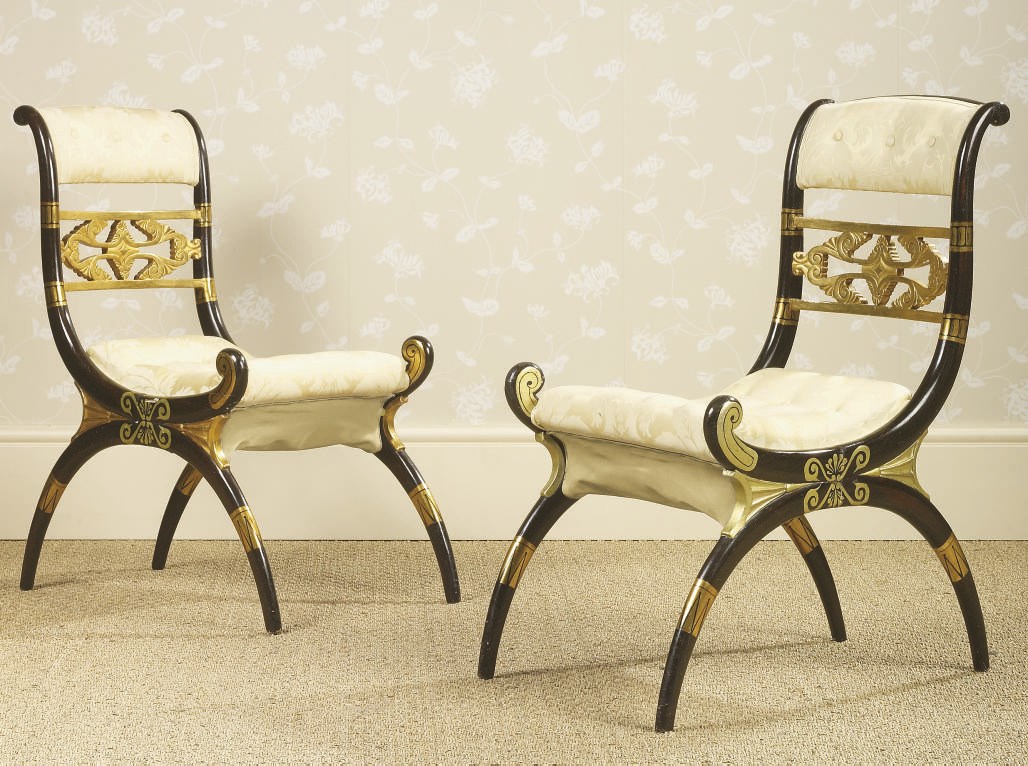 A PAIR OF ENGLISH PARCEL-GILT AND SIMULATED ROSEWOOD SIDE-CHAIRS