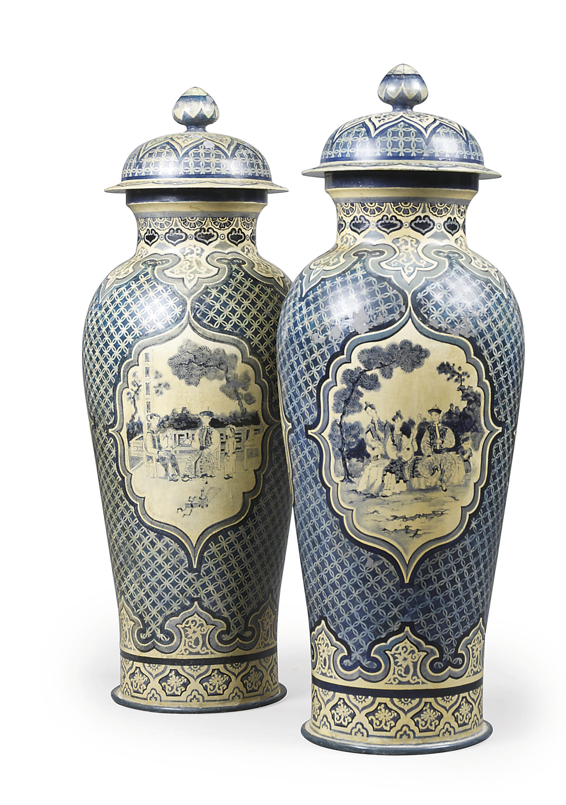 A PAIR OF TOLE PEINTE BLUE AND WHITE PALACE URNS