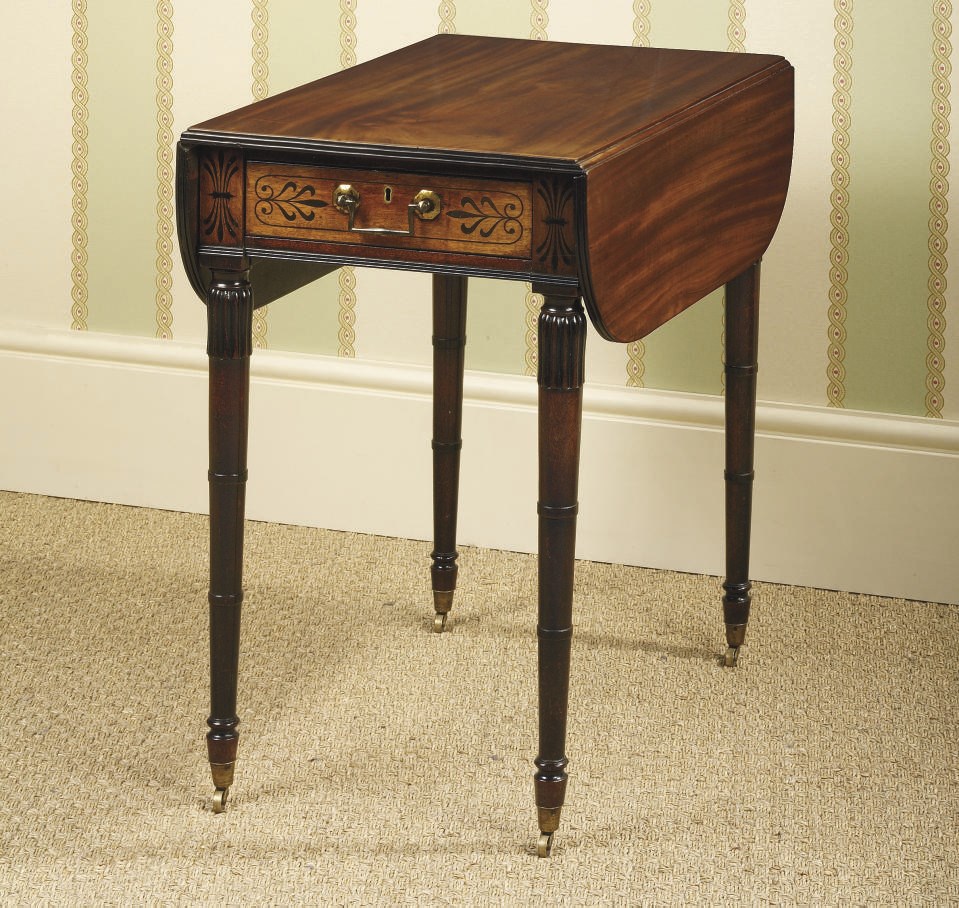 A REGENCY EBONY-INLAID MAHOGANY PEMBROKE TABLE