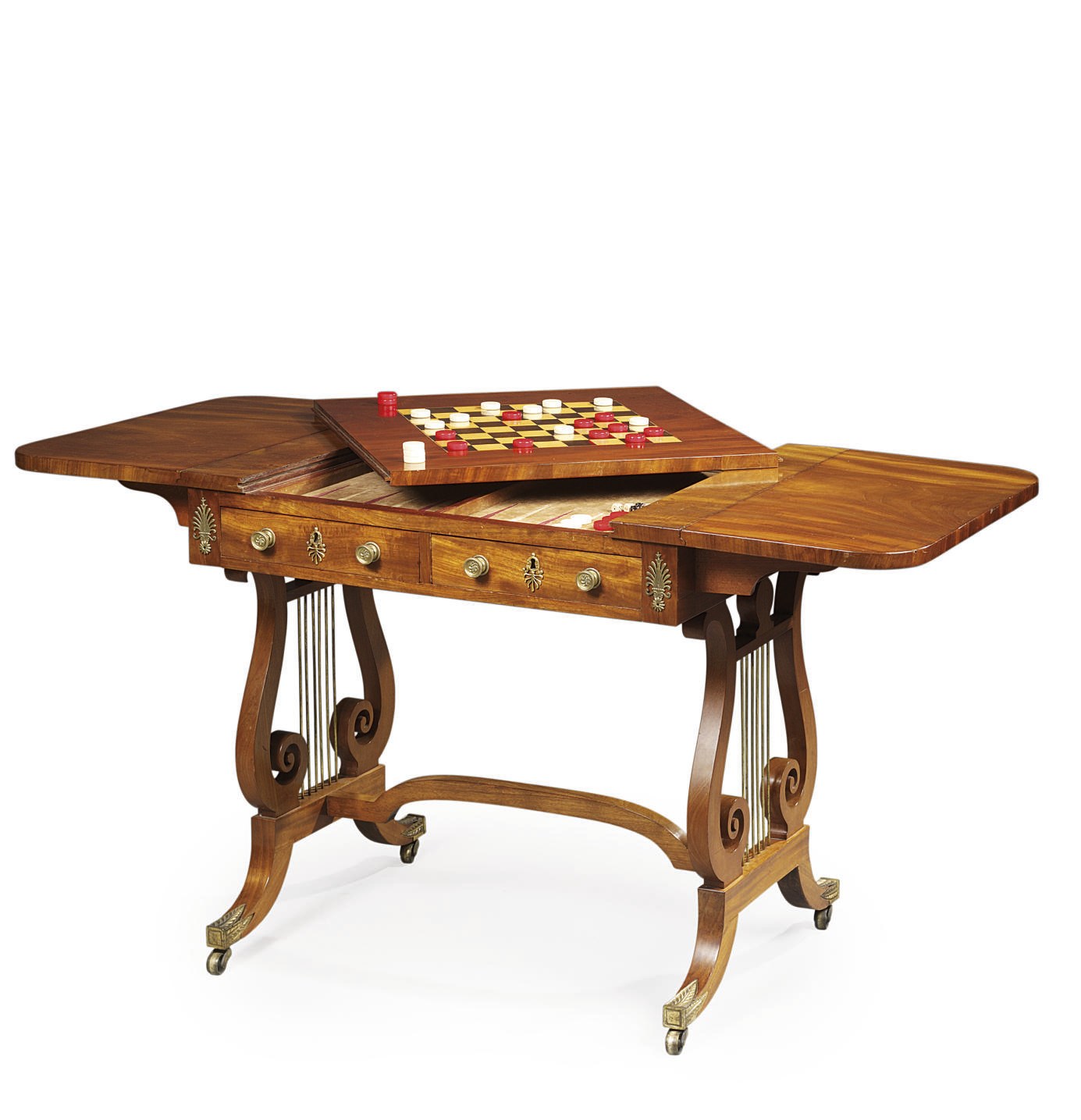 A REGENCY BRASS-MOUNTED MAHOGANY GAMES TABLE