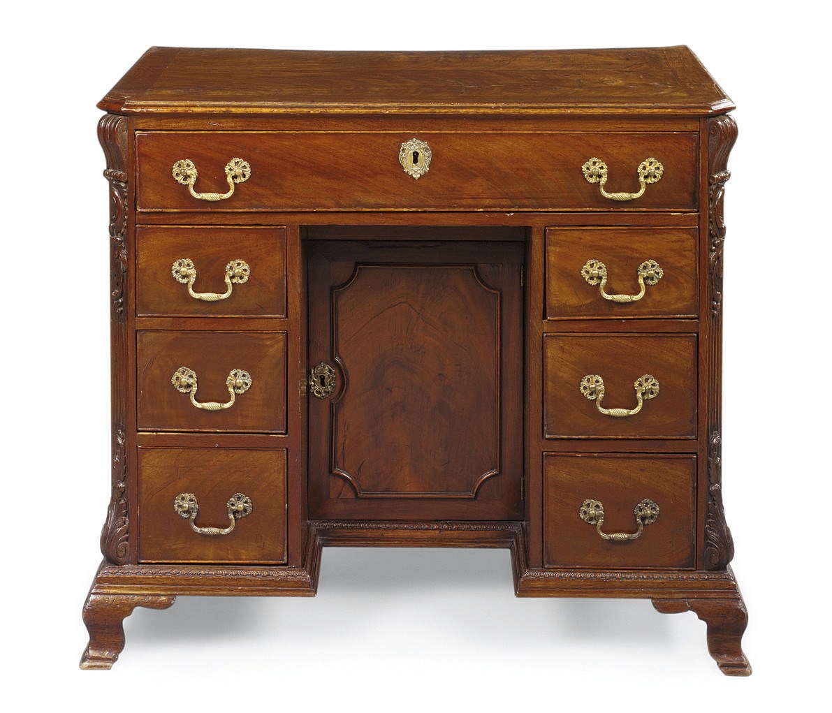 A GEORGE II MAHOGANY KNEEHOLE DESK