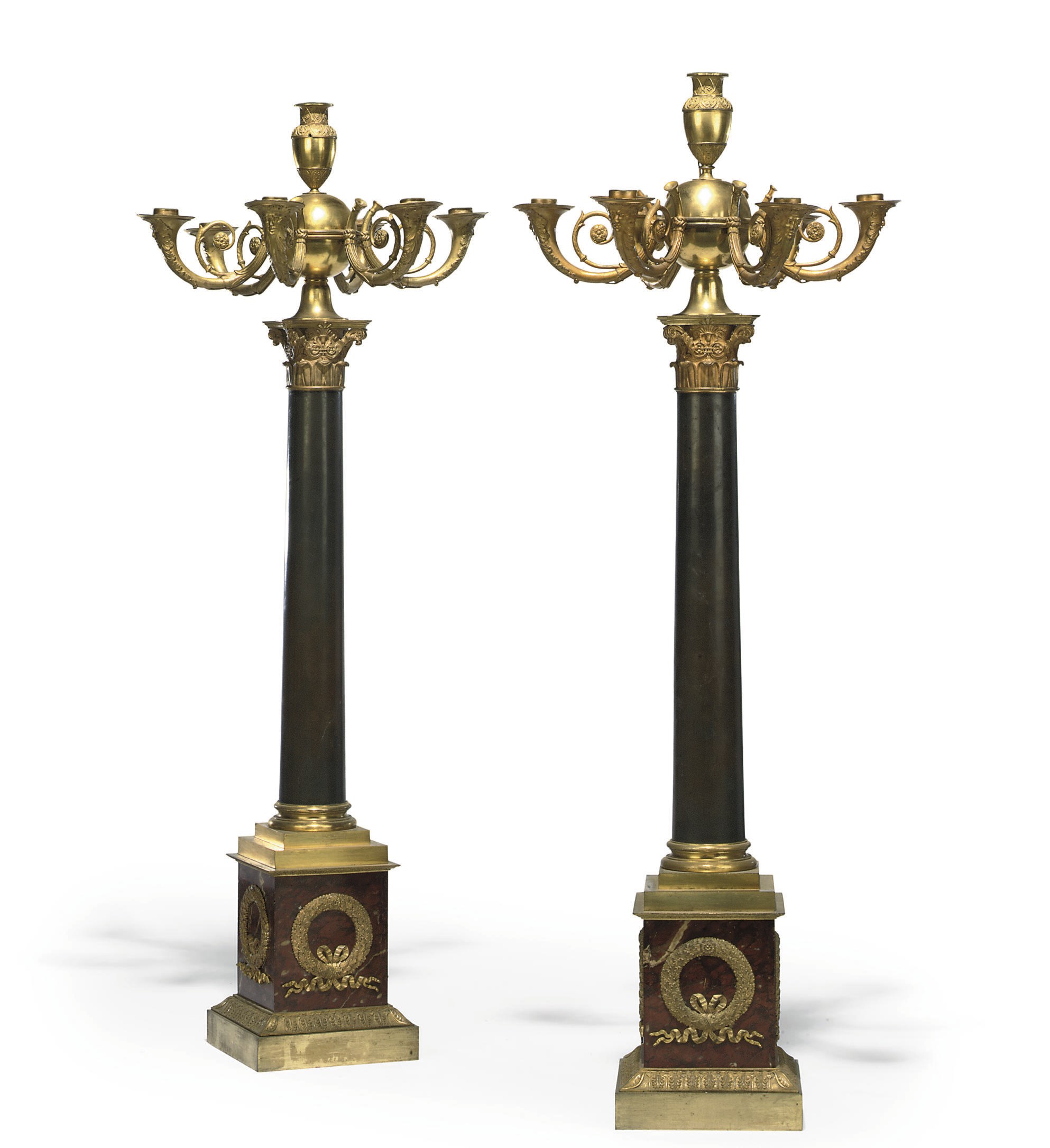 A PAIR OF EMPIRE ORMOLU, PATINATED BRONZE AND ROUGE GRIOTTE MARBLE SEVEN-LIGHT CANDELABRA