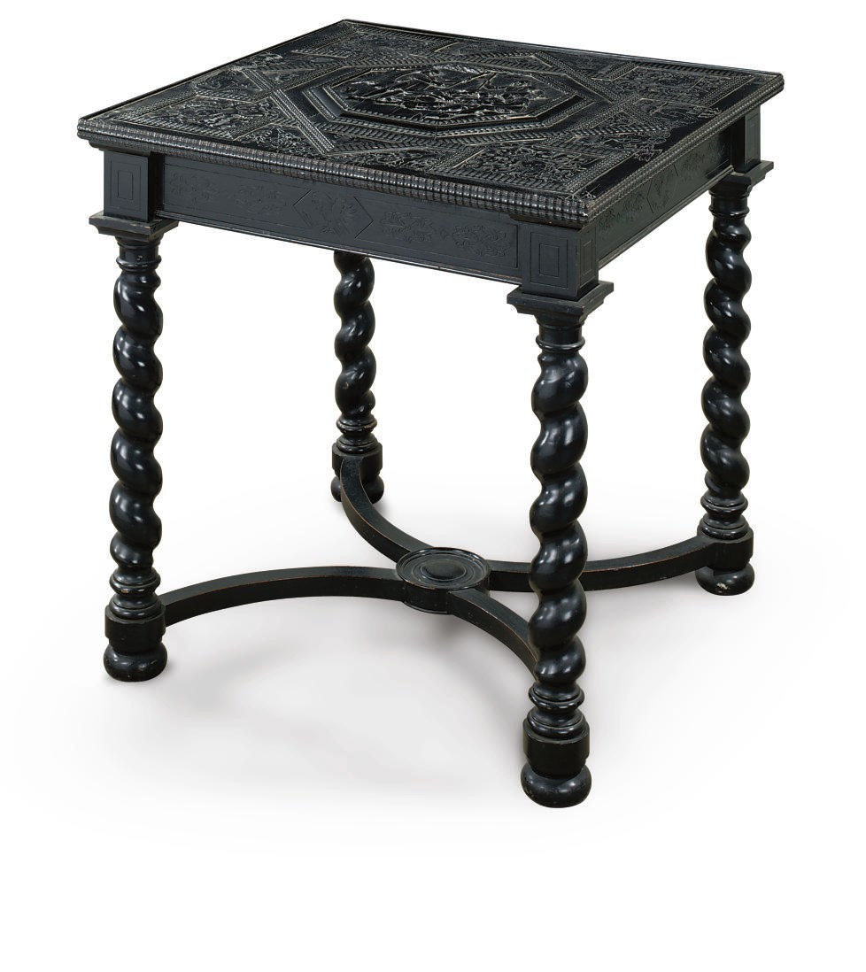 AN EBONY AND EBONISED ANTIQUARIAN CENTRE TABLE