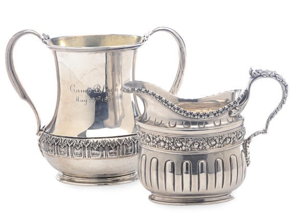 AN AMERICAN SILVER A CREAM JUG AND A TWO-HANDLED TROPHY,
