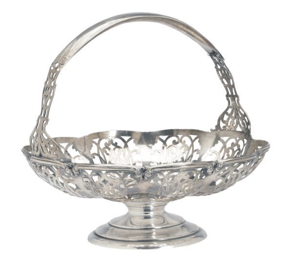 A PAIR OF GERMAN SILVER BOWLS, AN AMERICAN SILVER BASKET WITH OVERHANDLE AND A TWO-HANDLED BOWL,