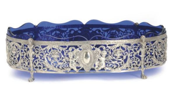 A CONTINENTAL SILVER CENTERBOWL WITH BLUE GLASS LINER,