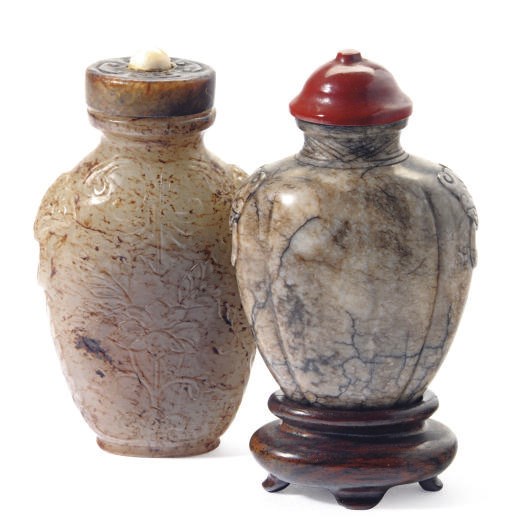 TWO CHINESE CARVED JADE SNUFF BOTTLES,**