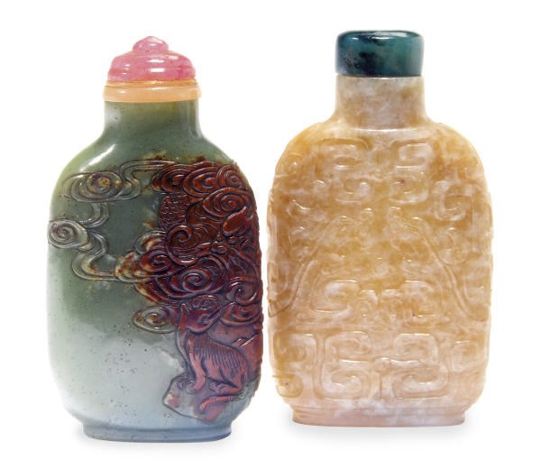 TWO CHINESE CARVED JADE SNUFF BOTTLES,**