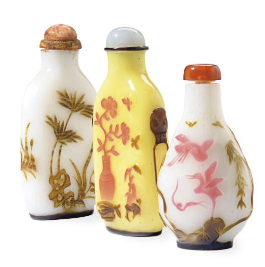 THREE OVERLAY WHITE GLASS BOTTLES,**