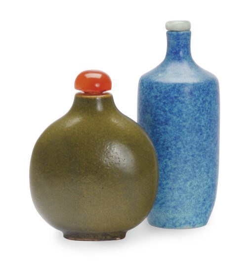 A CHINESE TEA DUST-GLAZED PORCELAIN SNUFF BOTTLE AND A ROBIN'S EGG-GLAZED CYLINDRICAL SNUFF BOTTLE,**