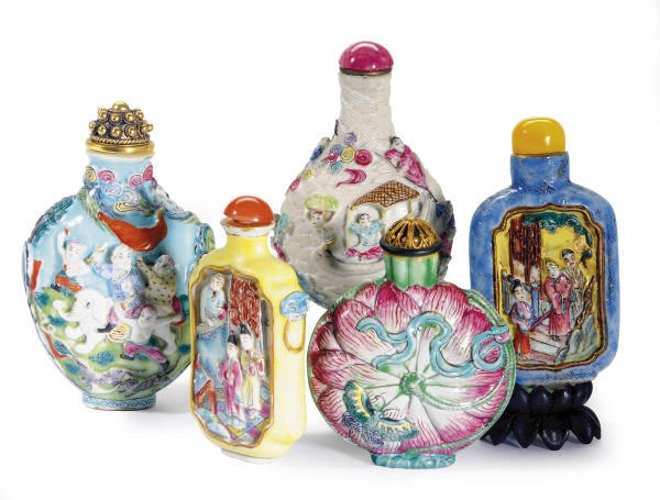 FIVE CHINESE FAMILLE ROSE MOLDED PORCELAIN SNUFF BOTTLES,**