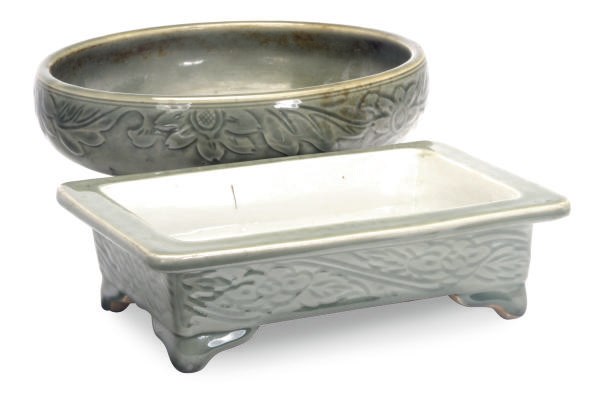 A CELADON GLAZED CENSER ON THREE FEET AND RECTANGULAR JARDINERE,