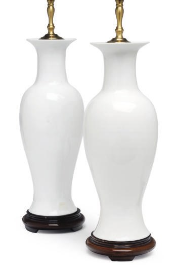 A PAIR OF CHINESE PORCELAIN WHITE-GLAZED BALUSTER VASES MOUNTED AS LAMPS,