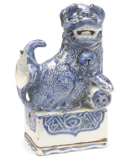 A PORCELAIN BLUE AND WHITE BUDDHISTIC LION-SHAPED CENSER AND STAND,