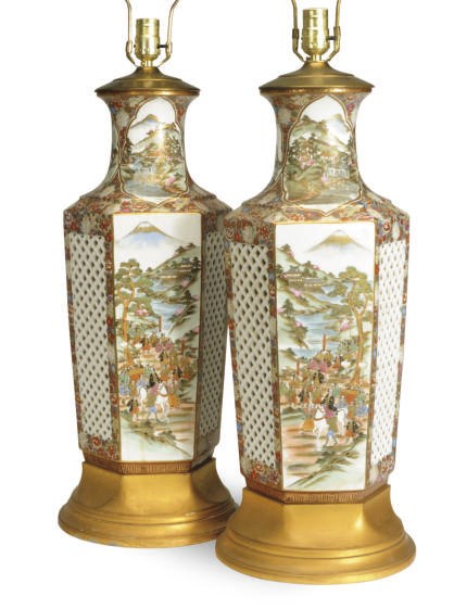 A PAIR OF JAPANESE PORCELAIN RETICULATED VASES MOUNTED AS LAMPS,