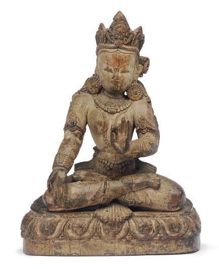 A NEPALESE POLYCHROME-PAINTED WOOD FIGURE OF TARA,