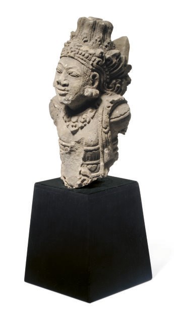 A KHMER TERRACOTTA FIGURE OF A DEITY,