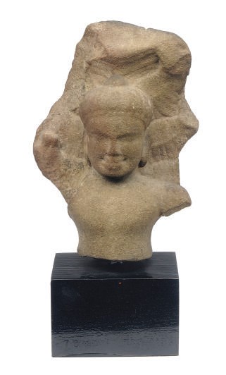 A KHMER SANDSTONE FRAGMENT OF THE BUDDHA MUKHALINDA,