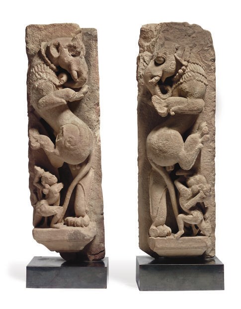 A PAIR OF INDIAN RED SANDSTONE MYTHICAL LIONS, VYALA,