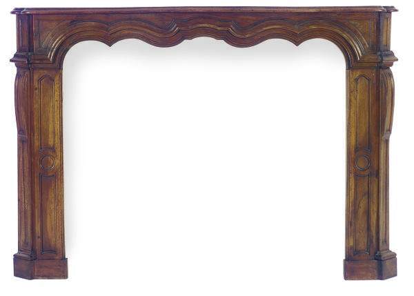 A CARVED WALNUT FIREPLACE SURROUND,